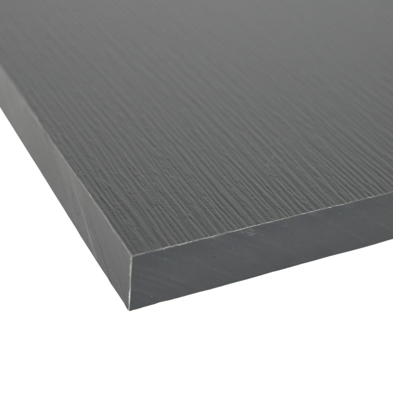 Close-up of a dark gray rectangular sheet with a textured surface on a white background