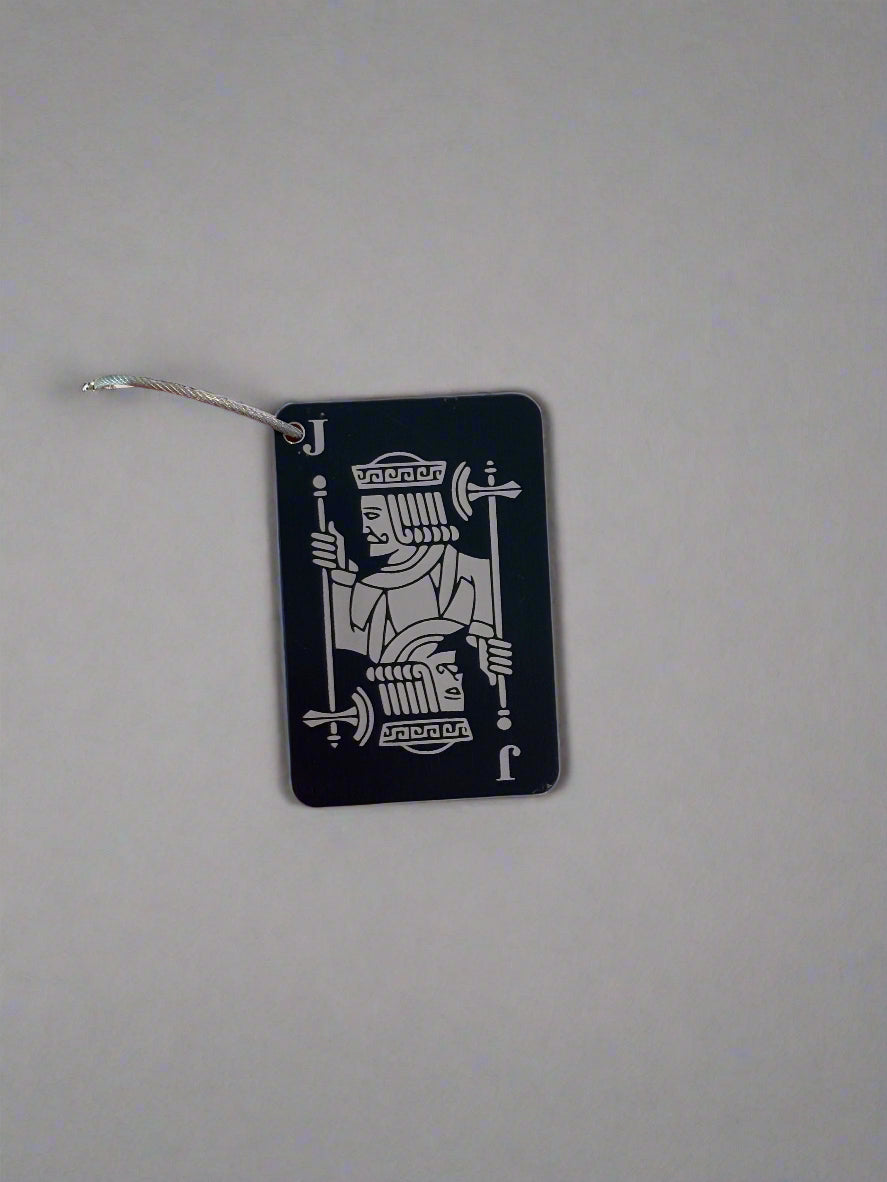 Black Rectangular tag with custom engraving of a jack card. Made to go on a golf bag
